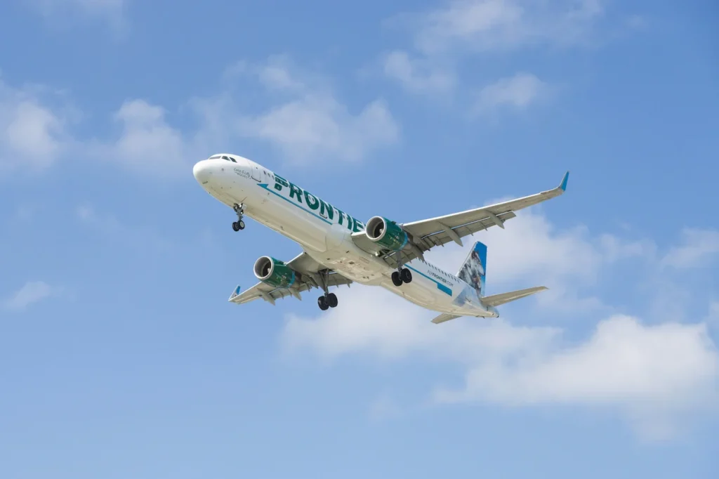 Frontier Airlines Airbus A321 in flight with landing gear deployed