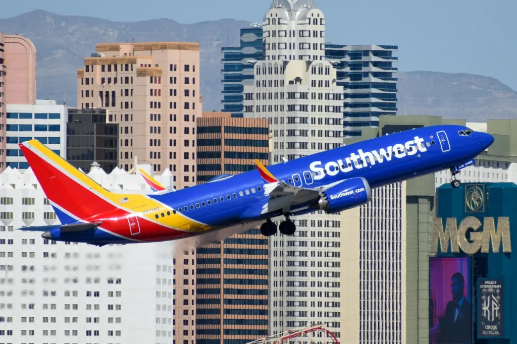 A Southwest Airlines Boeing 737 MAX 8 airplane taking off over Las Vegas