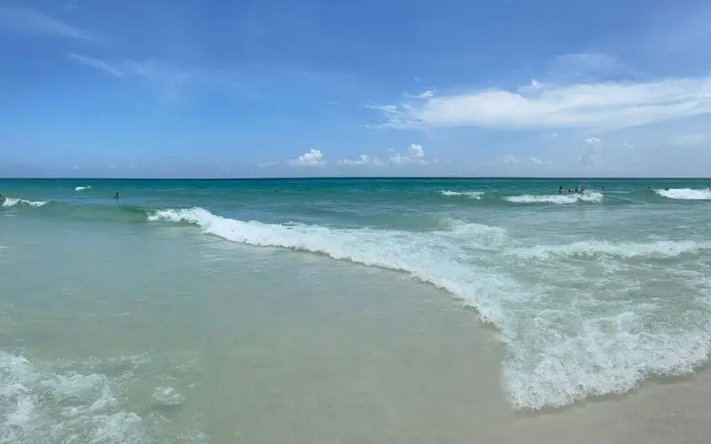Gentle waves on the sandy shore of Princess Beach in Destin.