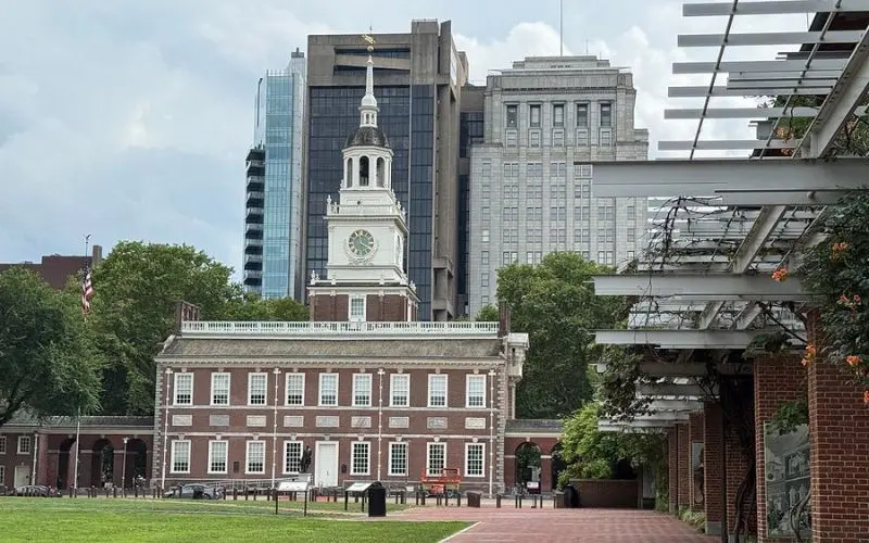 The historic Independence Hall stands near the Liberty Bell in Philadelphia.