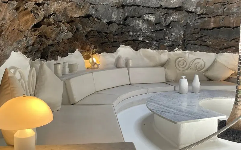 White cave-style seating area at César Manrique Foundation.