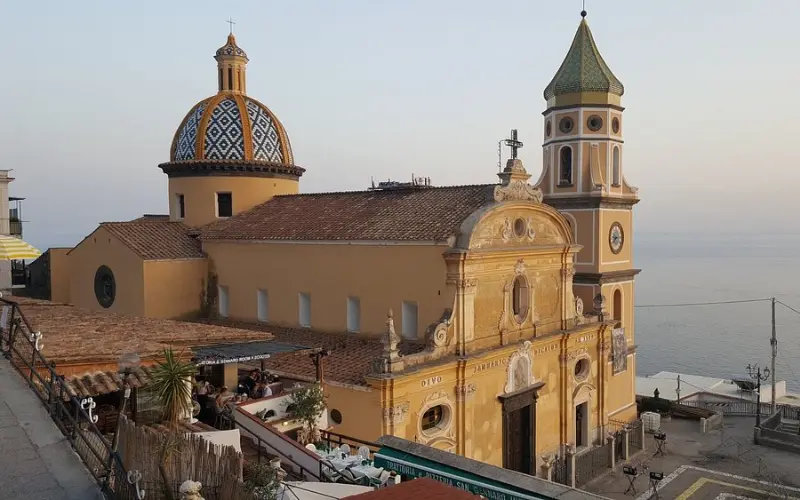 Church of San Gennaro with colorful dome in Praiano.