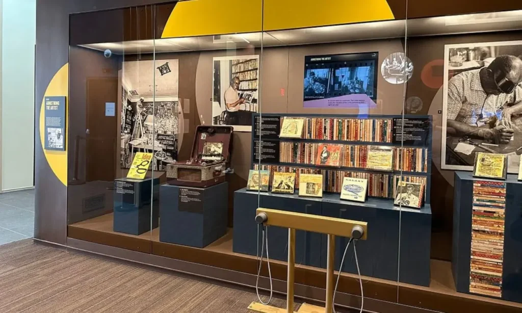 A display of records, photos, and memorabilia inside the Louis Armstrong House Museum.