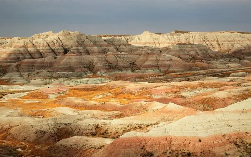 The colorful layered rock formations of Badlands National Park.