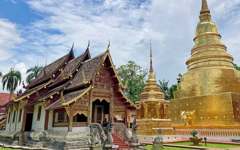 Golden stupas and intricate temples stand at Wat Phra Singh in Chiang Mai.