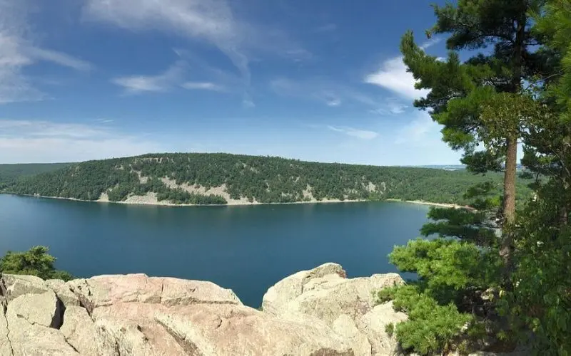 A scenic overlook above the blue waters of Devil’s Lake State Park.