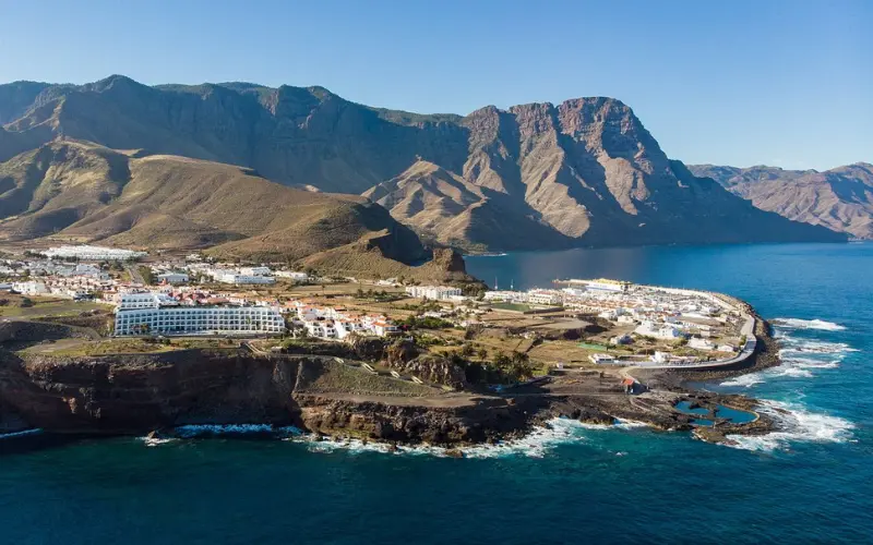 Mountain backdrop and coastal town on Gran Canaria.