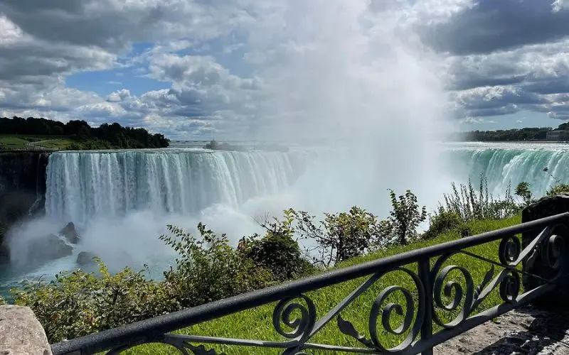 Powerful waterfall with mist rising at Niagara Falls.