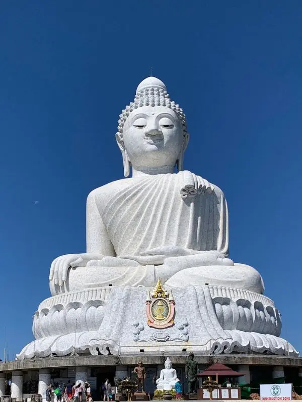 The massive white Big Buddha statue sits atop a hill in Phuket.