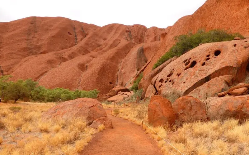 Red rock formations and a walking trail at Uluru-Kata Tjuta National Park.