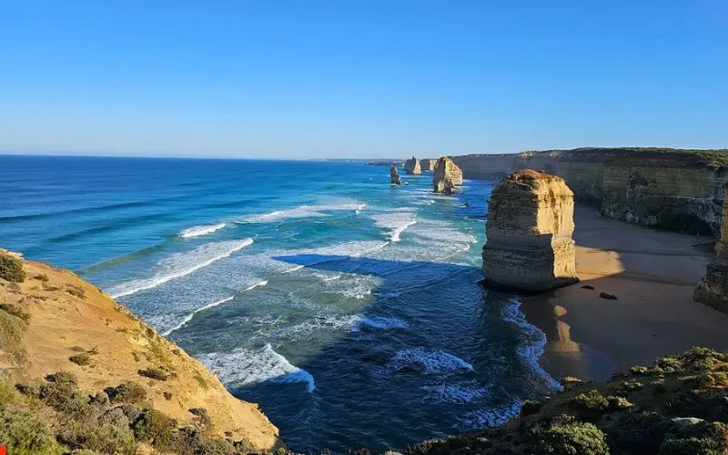Coastal cliffs and limestone stacks along the Twelve Apostles on the Great Ocean Road.