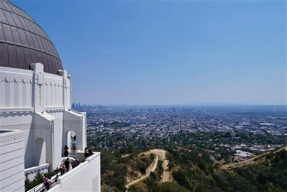 Griffith Observatory overlooking Los Angeles with city views in the distance.