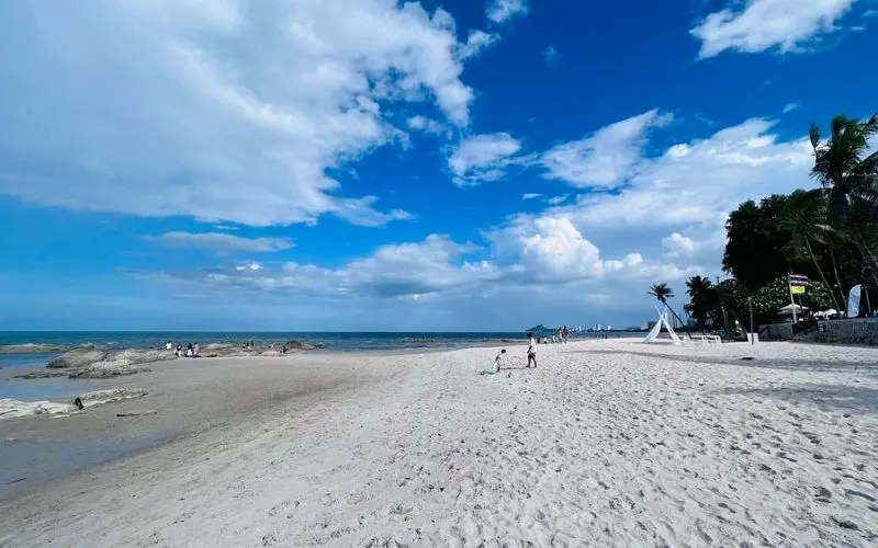 A wide sandy shoreline stretches along Hua Hin Beach.