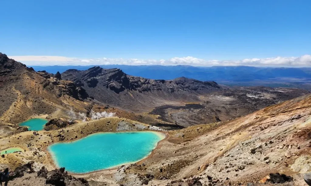 Volcanic landscape with bright blue lakes in Tongariro National Park.