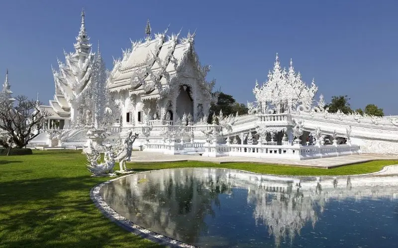 The ornate white temple Wat Rong Khun stands in Chiang Rai.