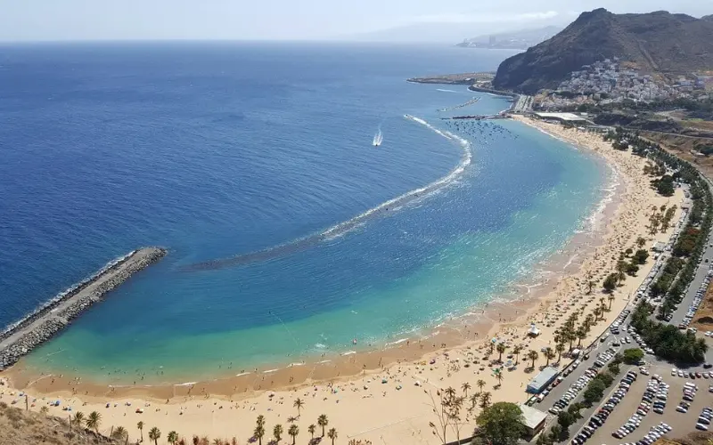 Golden sandy beach and turquoise water at Santa Cruz de Tenerife.