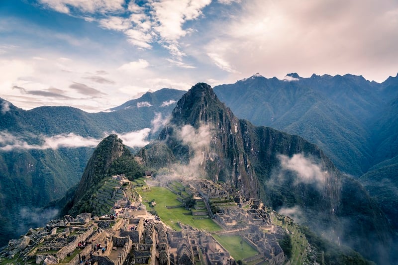 Ancient stone citadel Machu Picchu in Peru, surrounded by lush mountains is one of the top beautiful places in South America.