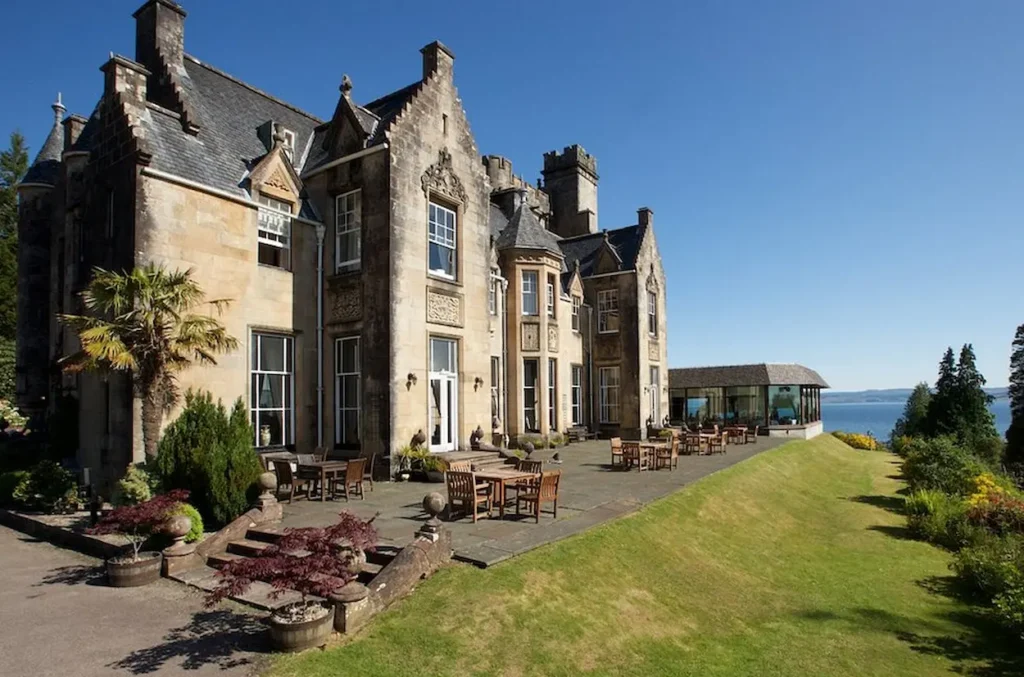 Rear facade and outdoor terrace of Stonefield Castle Hotel