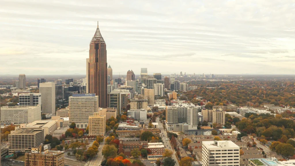 Aerial view of Midtown Atlanta skyscrapers stretching into the distance under clear skies