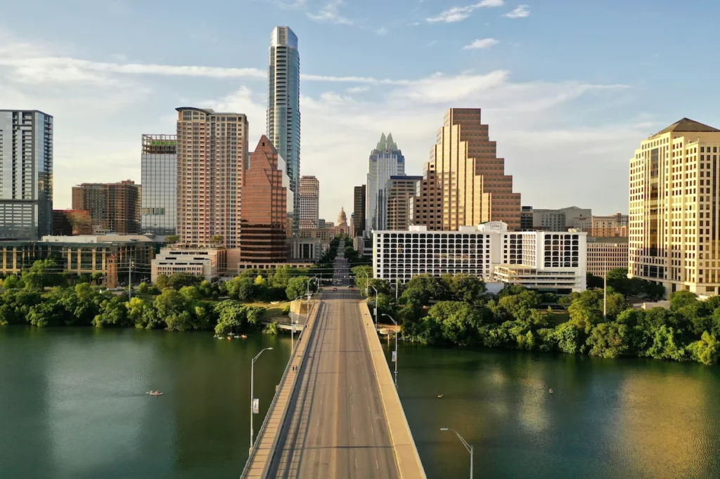 Austin skyline and Congress Avenue Bridge crossing Lady Bird Lake
