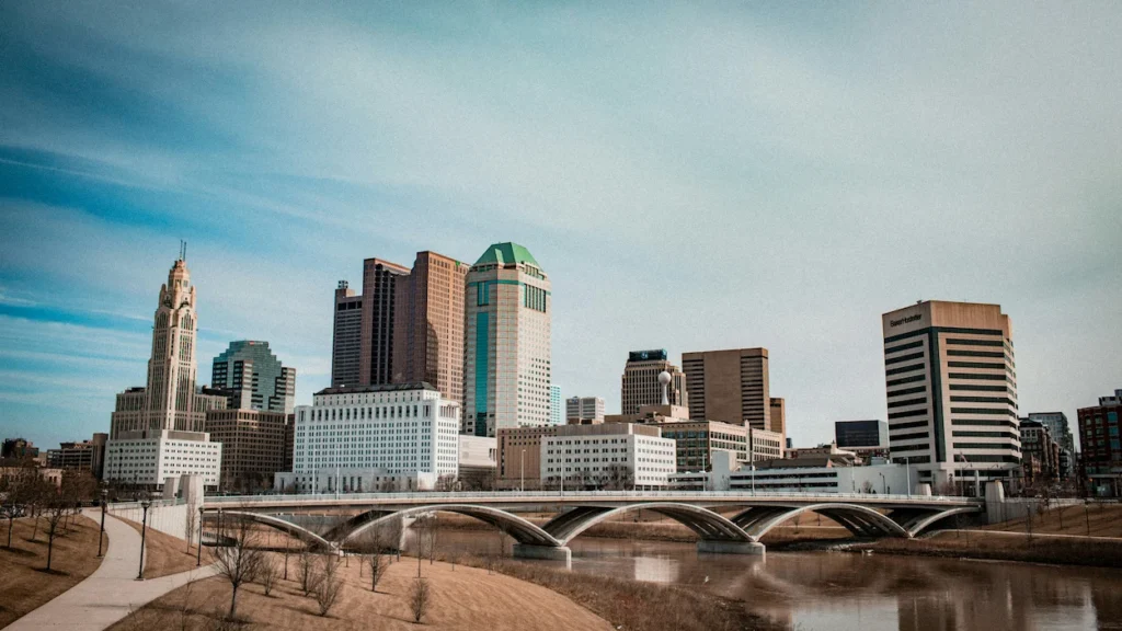 Columbus Ohio skyline and skyscrapers behind the Discovery Bridge over the Scioto River