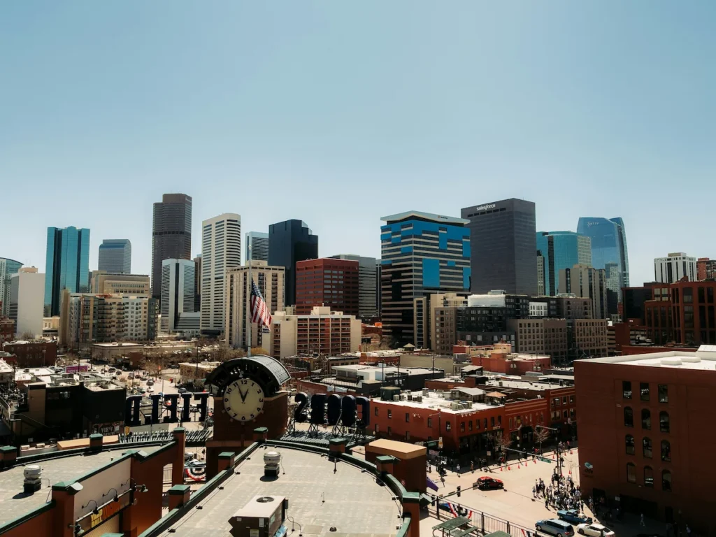 Denver city skyline viewed from the upper decks of Coors Field baseball stadium