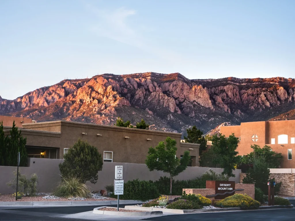 Desert Mountain neighborhood entry against rocky Sandia Mountains in Albuquerque, New Mexico