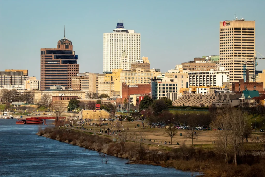 Downtown Memphis skyline viewed across the Mississippi River on a clear afternoon