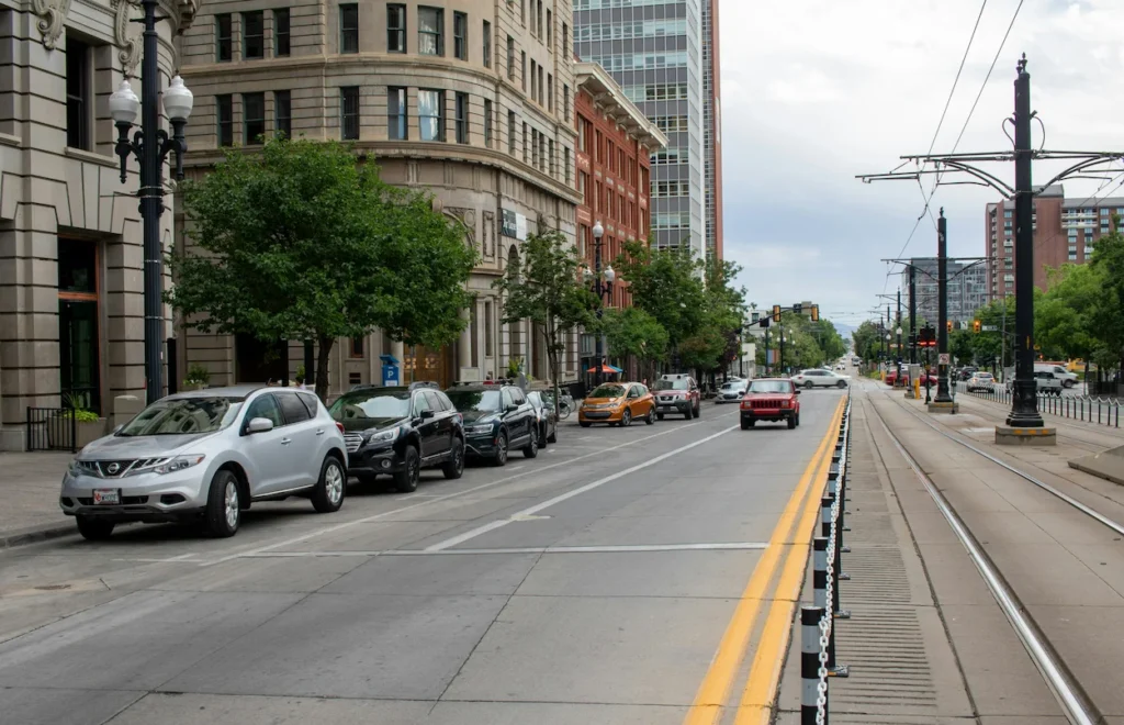 Street view of Main Street in downtown Salt Lake City with transit tracks