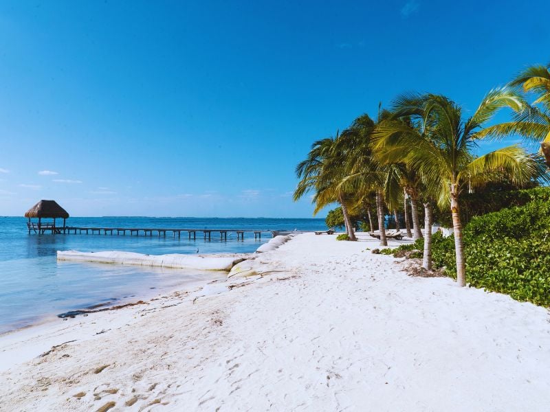 Pack your swimsuit and let the Caribbean beats of Cancun guide you to an affordable yet unforgettable vacation!