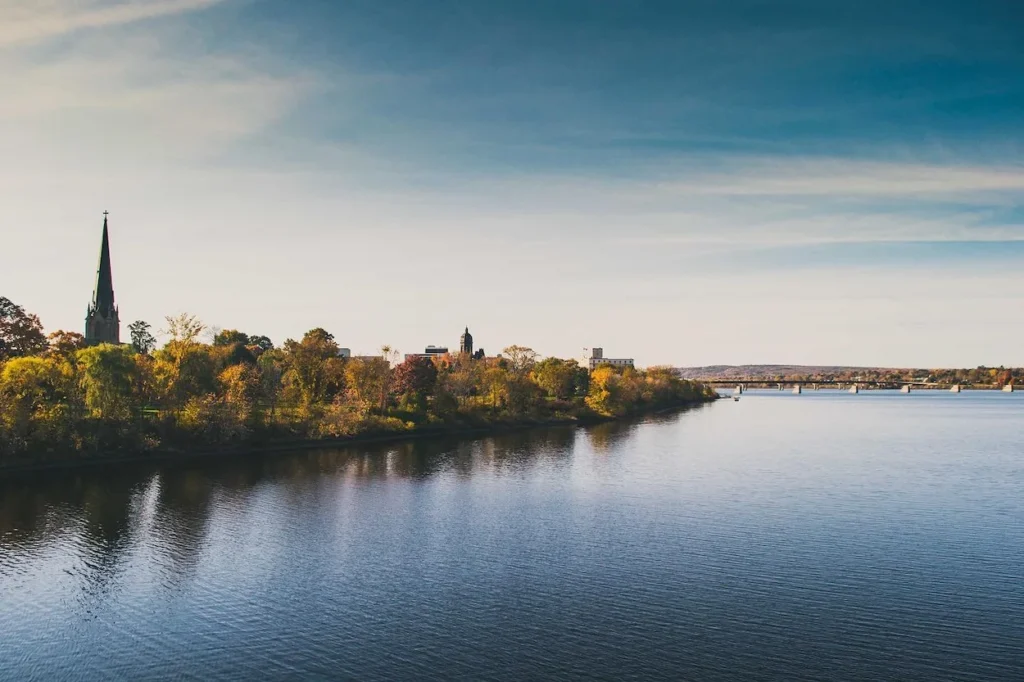 Fredericton skyline autumn trees Christ Church Cathedral spire Saint John River waterfront