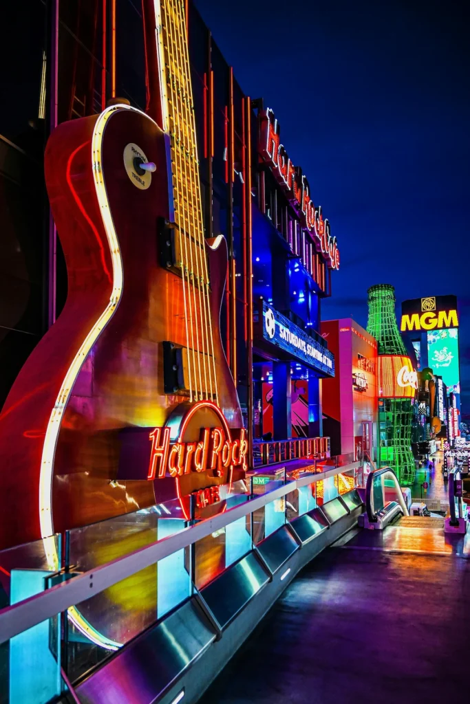 The iconic giant neon guitar sign outside the Hard Rock Cafe on the Las Vegas Strip at night
