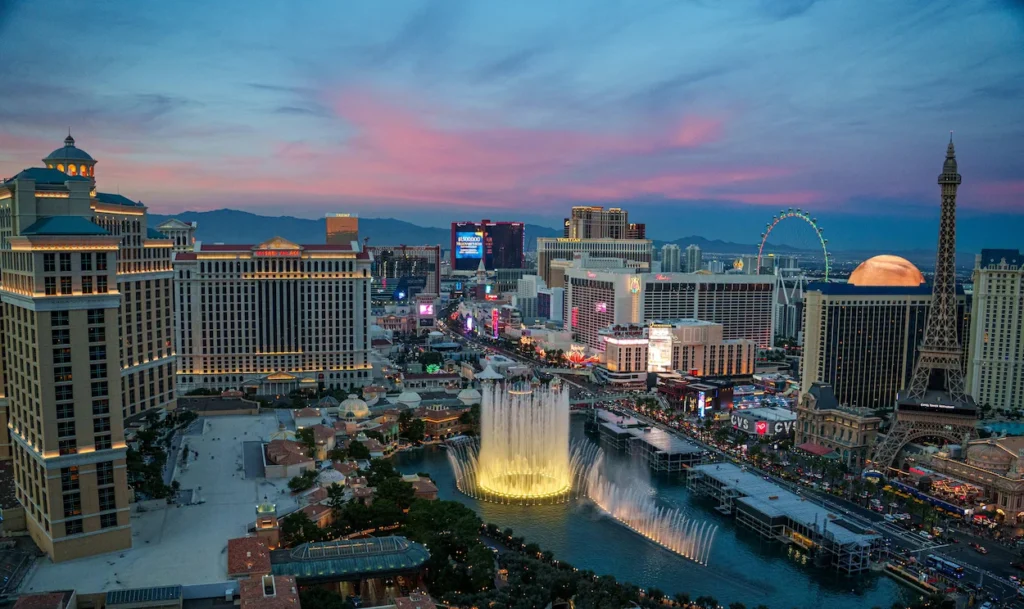 High-angle view of the Bellagio Fountains show and Paris Las Vegas Eiffel Tower on the Las Vegas Strip, Nevada