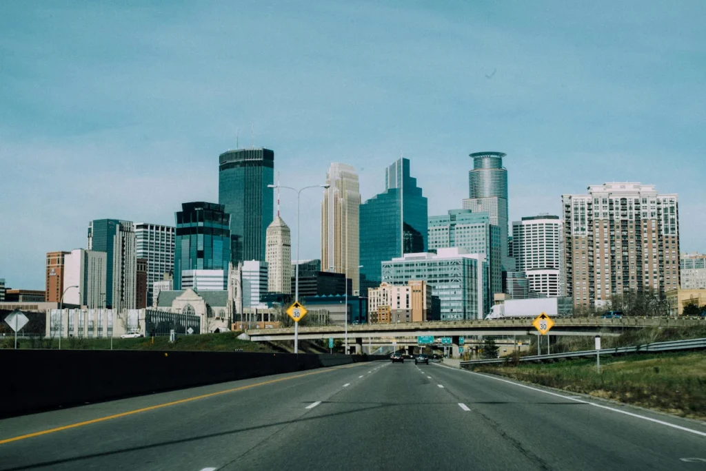 Highway approaching the downtown Minneapolis skyline