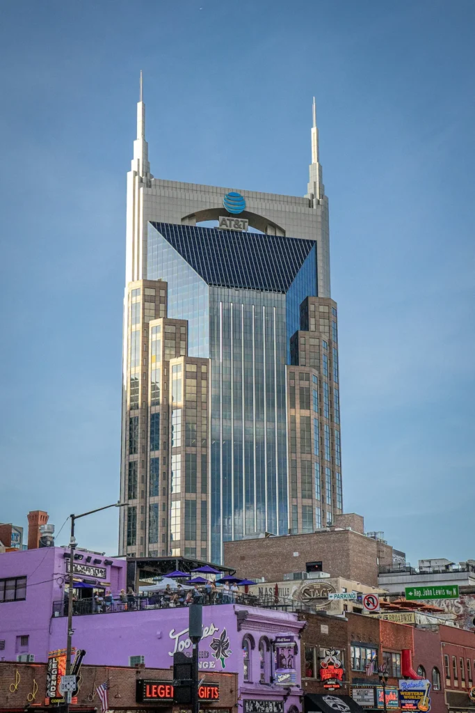 AT&T Building towering over the colorful honky-tonk bars of Broadway in Nashville, Tennessee