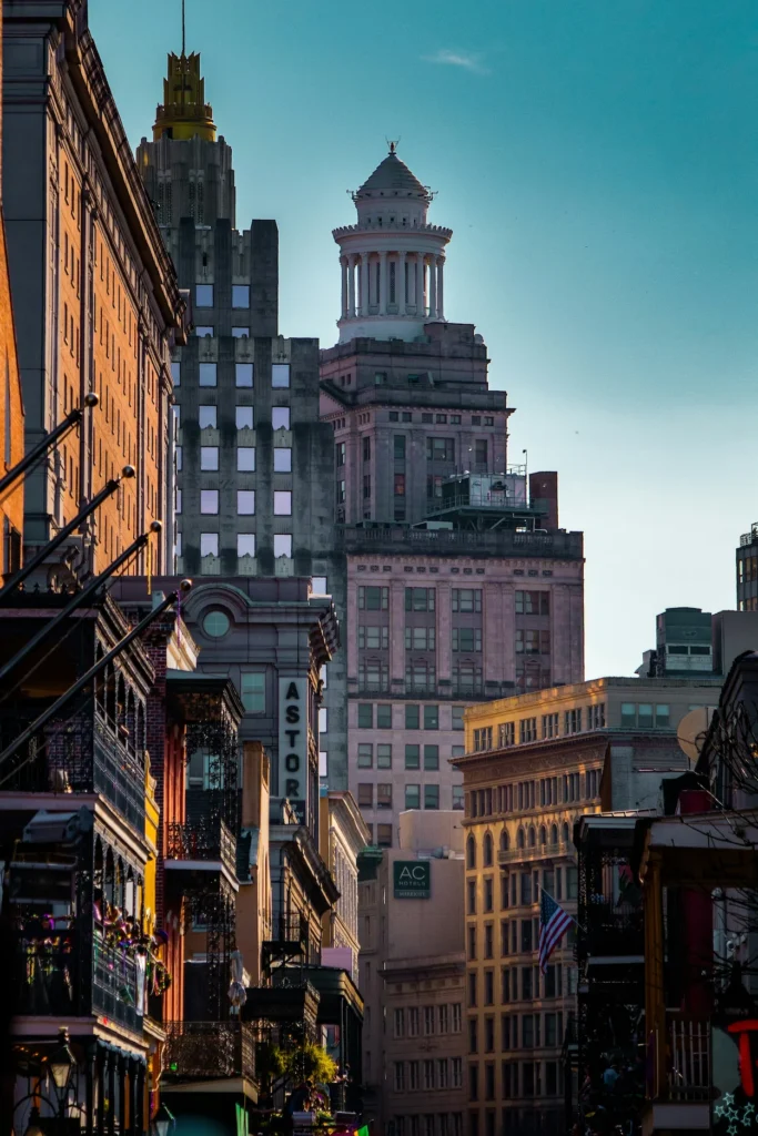 Bourbon Street buildings leading toward Hibernia Tower in New Orleans