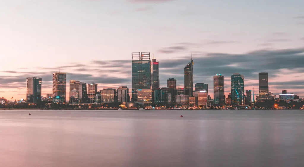 The Perth skyline across the Swan River at dusk