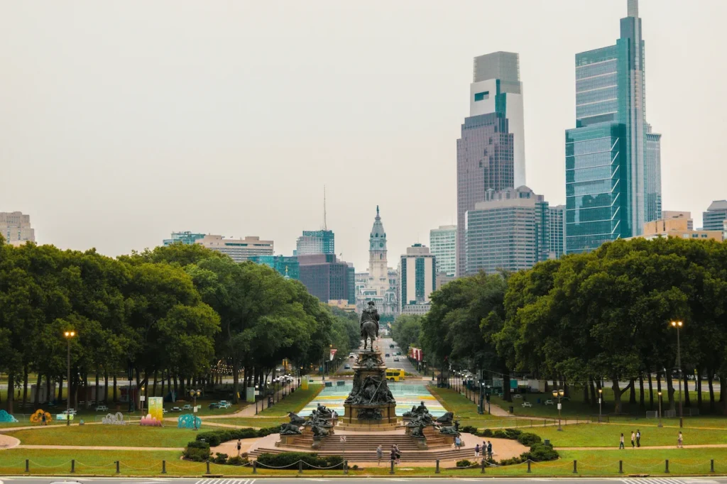 The Washington Monument fountain and Benjamin Franklin Parkway leading to City Hall in Philadelphia