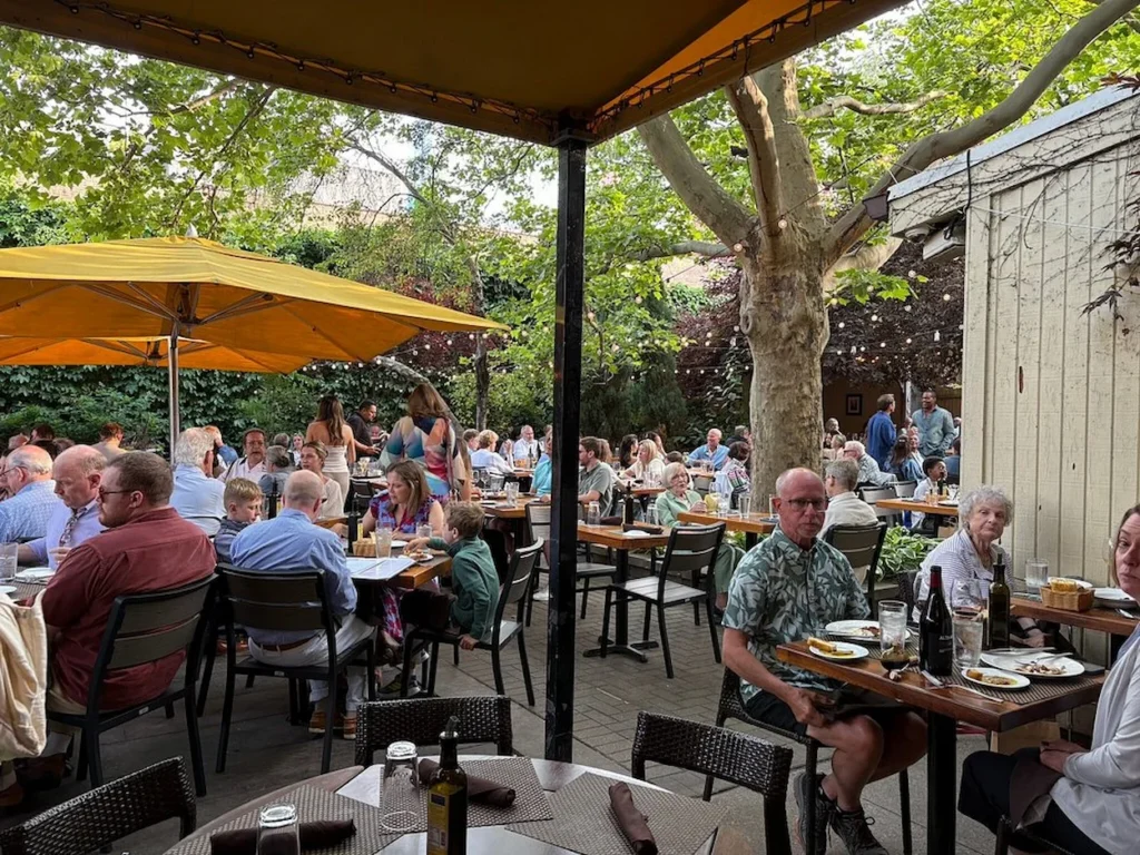 Garden patio dining area at Piccolo Sogno in River West, Chicago