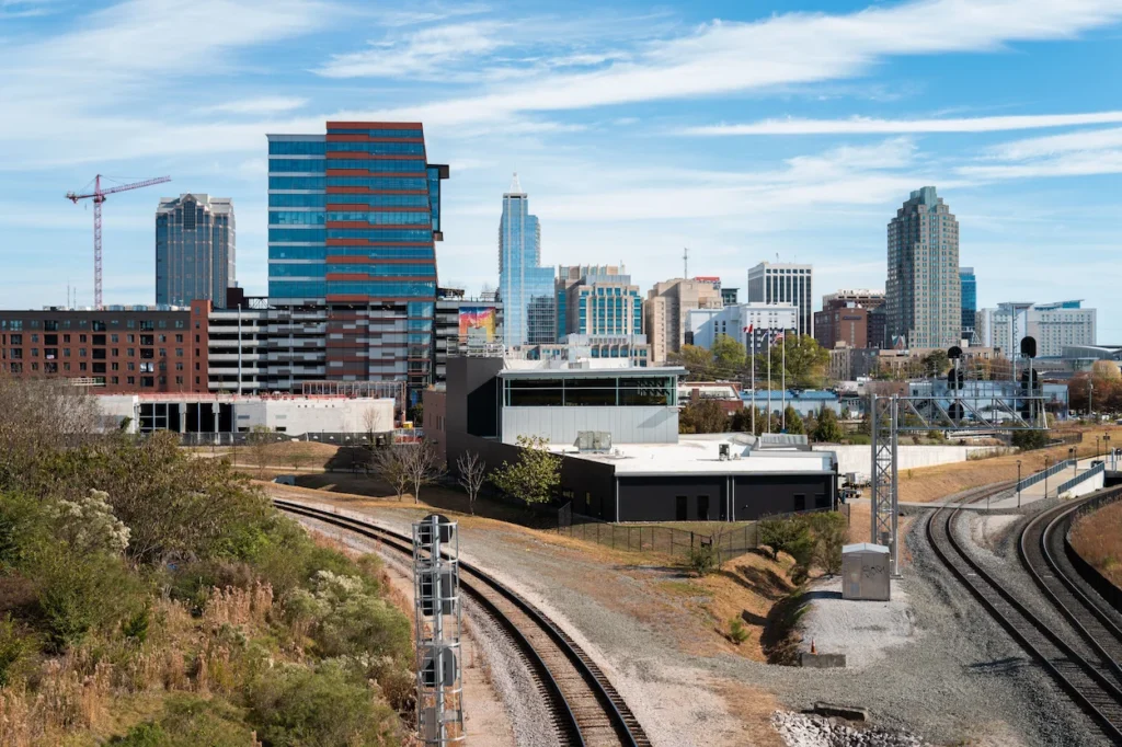 Raleigh skyline downtown skyscrapers railroad tracks viewed from Boylan Bridge