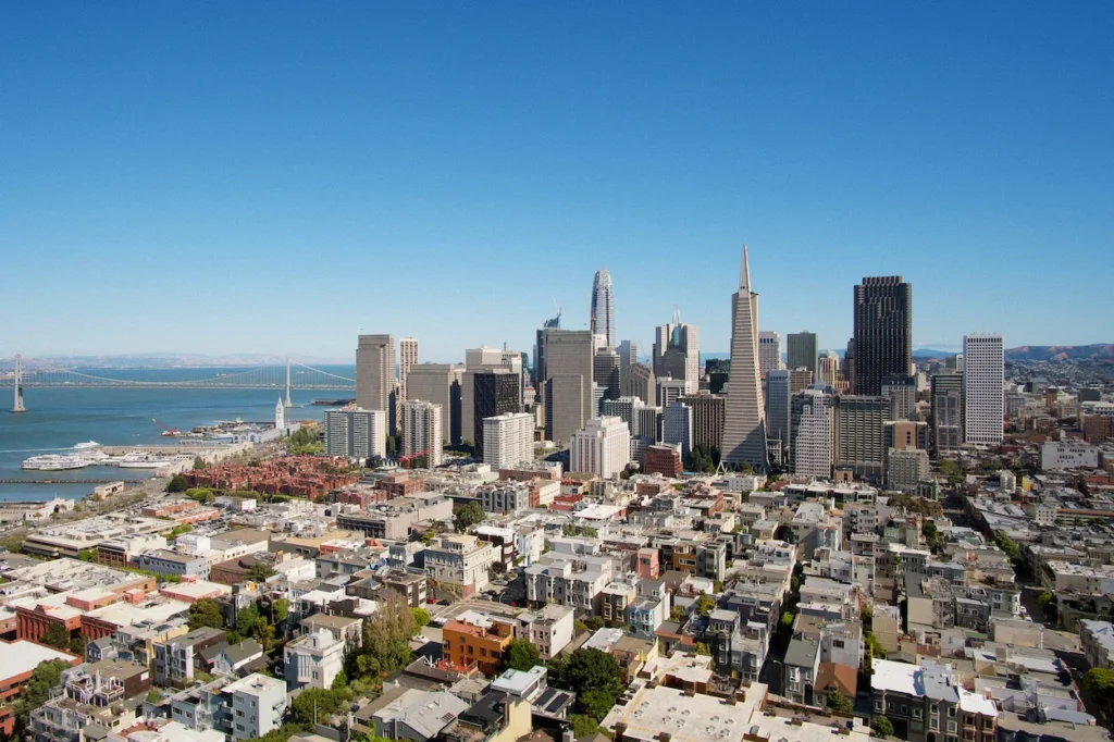 High-angle view of the San Francisco downtown skyline and Bay Bridge on a clear day