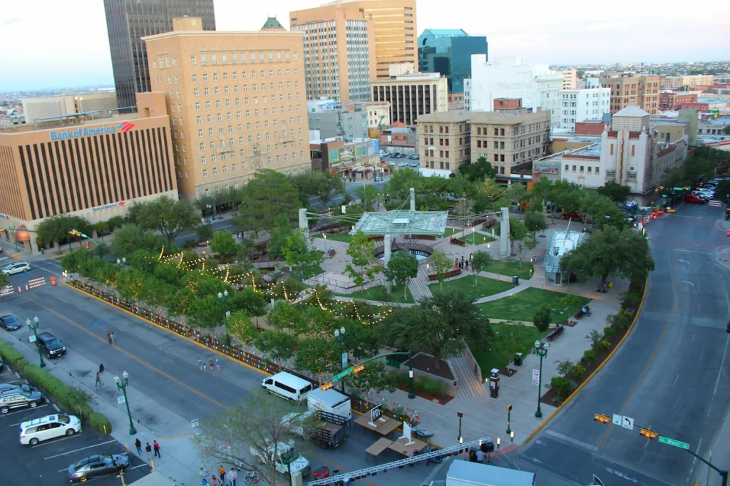 High-angle overview of San Jacinto Plaza surrounded by downtown buildings and streets in El Paso, Texas