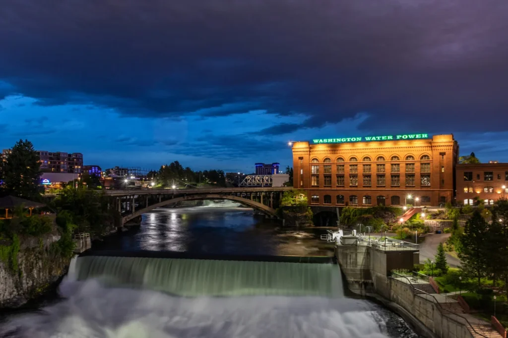 Washington Water Power building overlooks the powerful Spokane Falls in downtown Riverfront Park