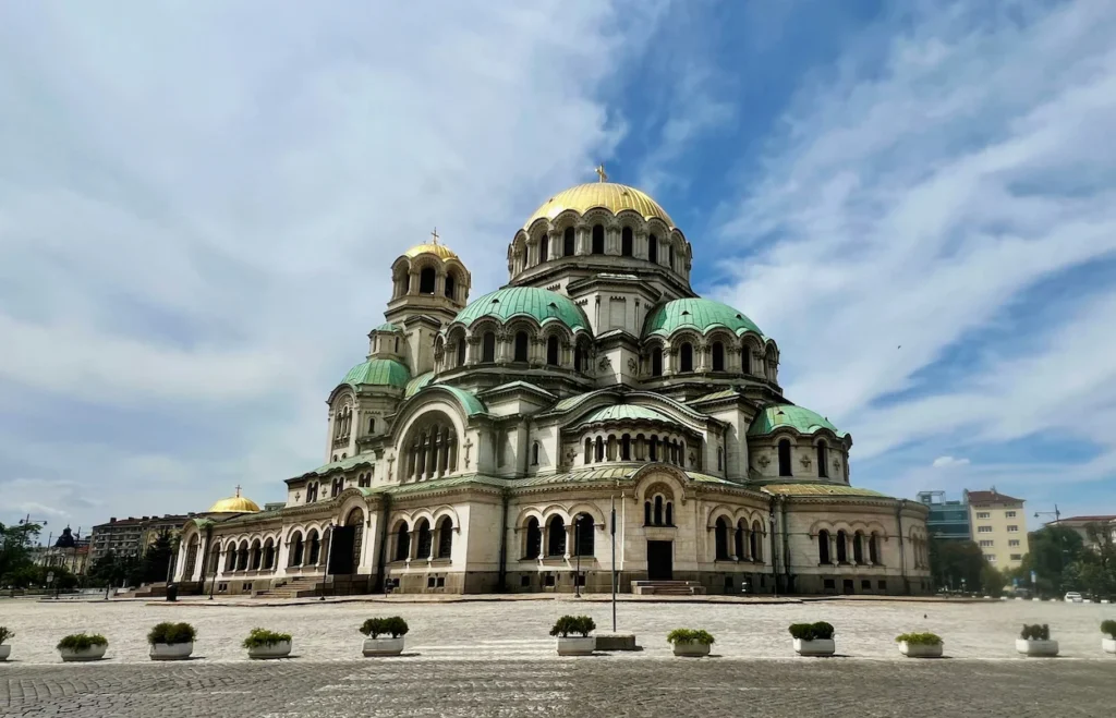 Neo-Byzantine St. Alexander Nevsky Cathedral featuring massive gold and green domes in Sofia