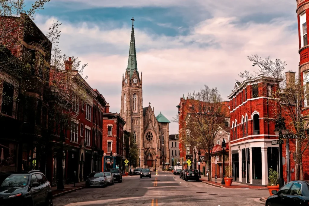 St. Francis de Sales Catholic Church steeple towering at the end of Woodburn Avenue in Cincinnati, Ohio