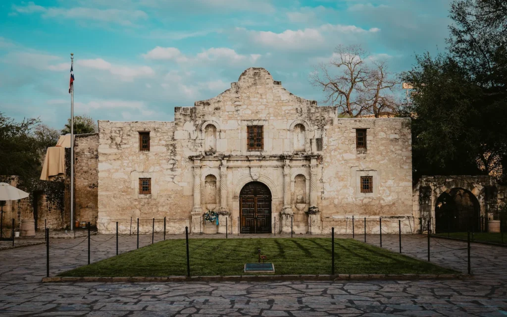Front facade of the historic stone Alamo mission building