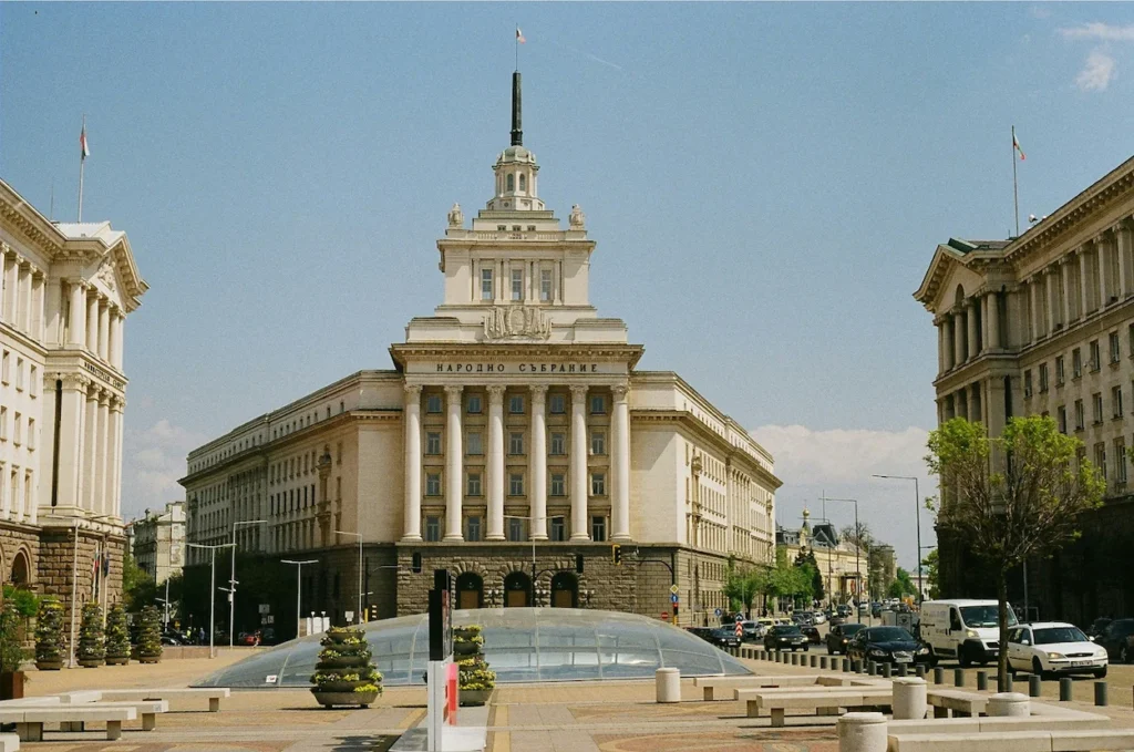 Former Party House building with white columns and central spire in downtown Sofia