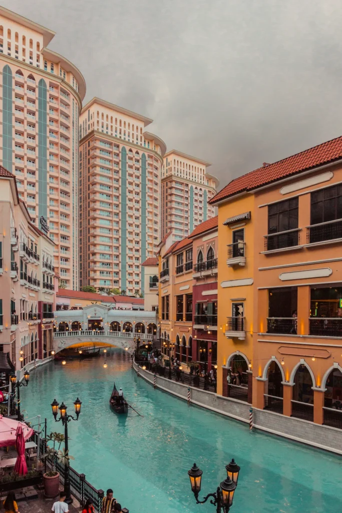 Venice Grand Canal Mall in Manila showing a gondola on the water canal flanked by Italian-style storefronts