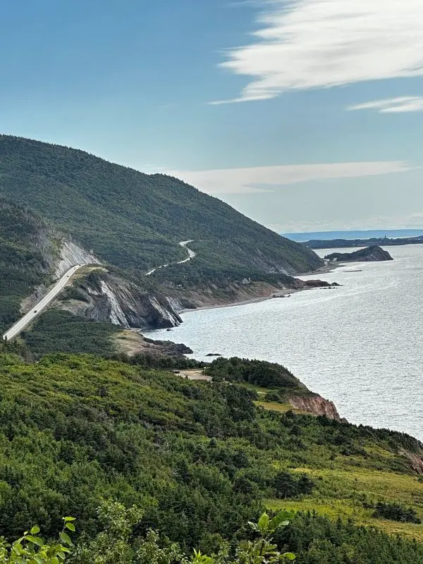 Winding coastal road along cliffs on the Cabot Trail.