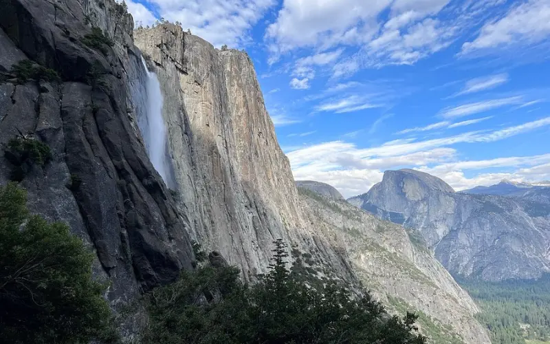 Sheer rock face and waterfall at El Capitan in Yosemite.